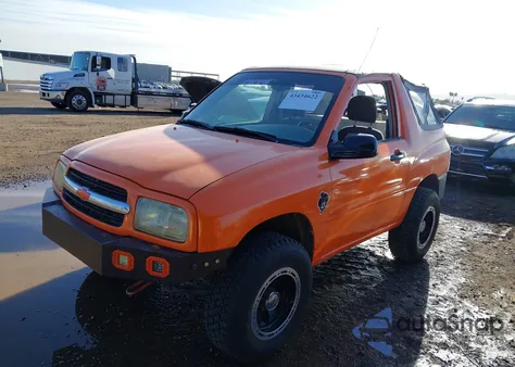 2000 Chevrolet Tracker из США, поврежденный, VIN 2CNBJ1863Y6920157